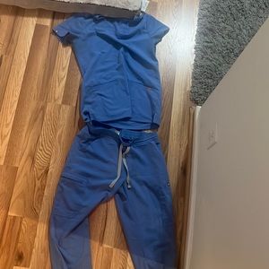 Ceil blue Fig Scrubs. Pants are size XS and double pocket top is size XXS